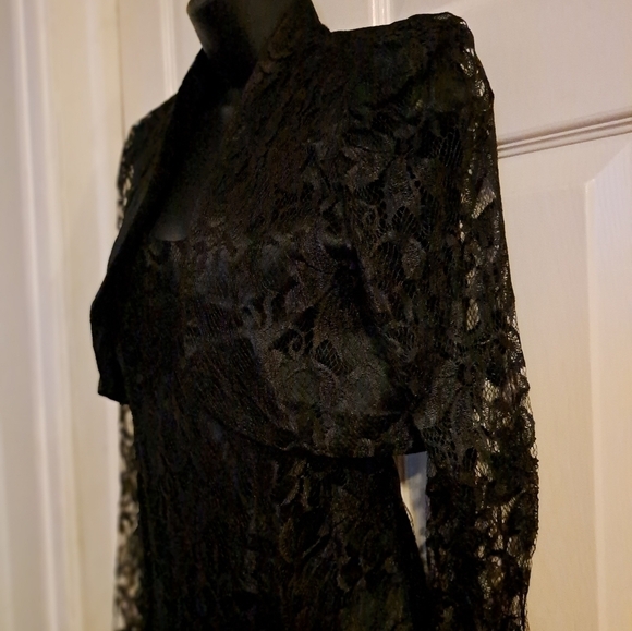All that jazzy two Piece Dress and jacket outer material is lace. - Picture 8 of 10